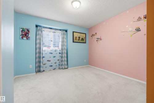 Secondary bedroom on the second floor - 6910 158A Avenue Nw, Edmonton, AB 