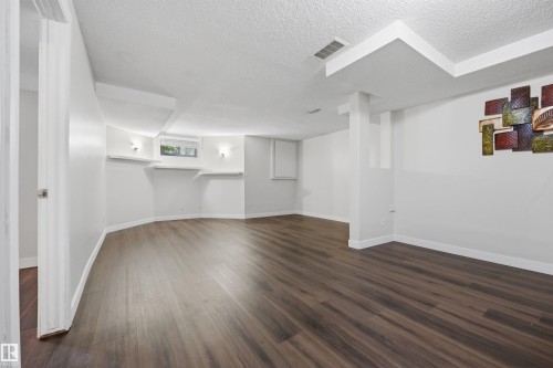 Large fully finished basement recreation room - 6910 158A Avenue Nw, Edmonton, AB 