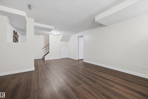 Large fully finished basement recreation room - 6910 158A Avenue Nw, Edmonton, AB 