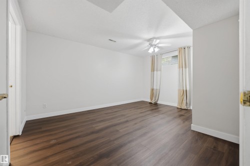 Large fully finished basement den with closet and ensuite bathroom - 6910 158A Avenue Nw, Edmonton, AB 