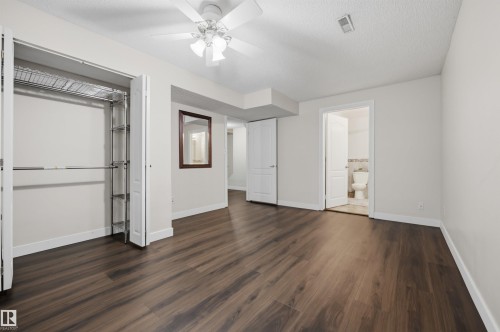 Large fully finished basement den with closet and ensuite bathroom - 6910 158A Avenue Nw, Edmonton, AB 