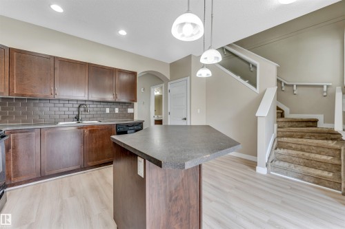 #27 13825 155 Av Nw, Edmonton, AB - Indoor Photo Showing Kitchen With Double Sink
