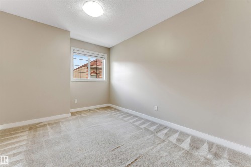 #27 13825 155 Av Nw, Edmonton, AB - Indoor Photo Showing Other Room