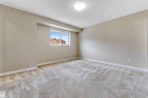 #27 13825 155 Av Nw, Edmonton, AB - Indoor Photo Showing Other Room