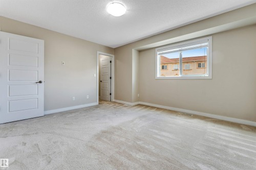 #27 13825 155 Av Nw, Edmonton, AB - Indoor Photo Showing Other Room