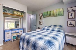 Carpeted interior room with light grey walls - 
