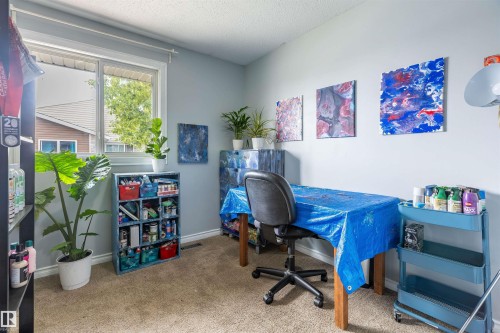 Bedroom featuring light grey walls and neutral carpet - 13323 47 Street Nw, Edmonton, AB - Indoor