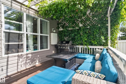 Private outdoor deck featuring wood-finish flooring - 22933 94A Avenue Nw, Edmonton, AB 
