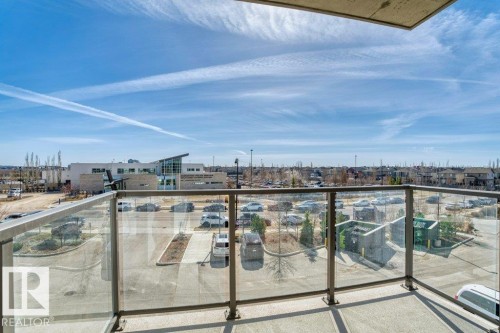 Private balcony with a concrete surface and glass railing - 1316 Windermere Way Sw, Edmonton, AB 
