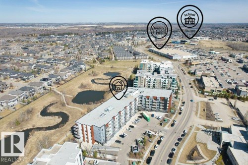 Aerial perspective showcasing a multi-story residential building - 1316 Windermere Way Sw, Edmonton, AB 