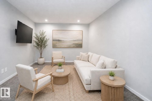 Recessed lighting illuminates neutral-toned walls AI - 9232 224 St Nw Nw, Edmonton, AB 