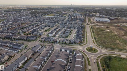 Aerial perspective showcasing a residential community with diverse housing styles - 9232 224 St Nw Nw, Edmonton, AB 