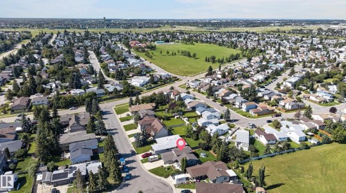 Residential neighborhood featuring varied rooflines and mature landscaping - 18316 71 Avenue Nw, Edmonton, AB 