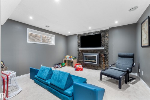 112 Appleton Crescent, Sherwood Park, AB - Indoor Photo Showing Other Room With Fireplace