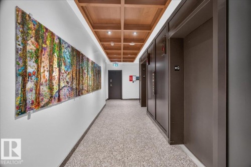 Wood-finish coffered ceiling with recessed lighting - #1102 9916 113 St Nw, Edmonton, AB 