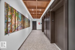 Wood-finish coffered ceiling with recessed lighting - 