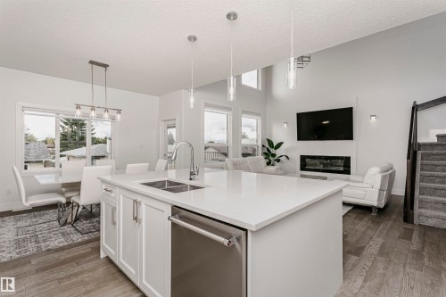 Open concept design with wood-finish flooring - 9107 181 Avenue Nw, Edmonton, AB 