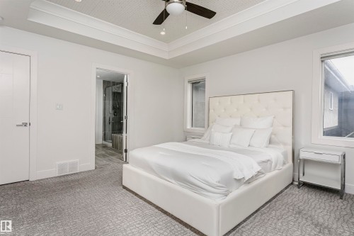 Tray ceiling with recessed lighting and ceiling fan - 9107 181 Avenue Nw, Edmonton, AB 