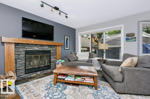 9607 101 Street Nw, Edmonton, AB - Indoor Photo Showing Living Room With Fireplace