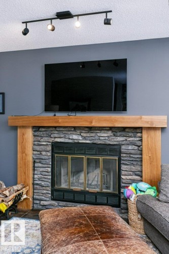 9607 101 Street Nw, Edmonton, AB - Indoor Photo Showing Living Room With Fireplace