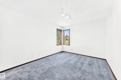Wall-to-wall carpeting and white walls - 