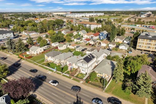 Residential property with a gabled roofline and solar panel installation - 11421 82 Street Nw, Edmonton, AB 