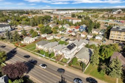 Residential property with a gabled roofline and solar panel installation - 