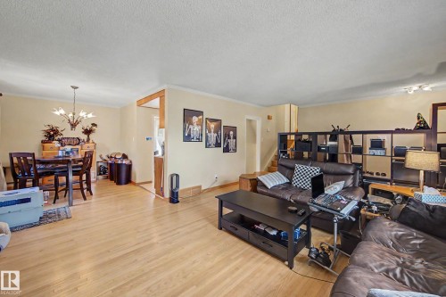 Hardwood-finish flooring throughout, crown molding, and recessed lighting - 11431 51 Avenue Nw, Edmonton, AB 