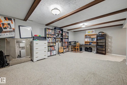 Exposed ceiling beams, recessed lighting, and built-in shelving units - 11431 51 Avenue Nw, Edmonton, AB 