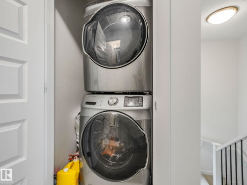 Dedicated laundry closet with stacked appliances - 3807 Weidle Crescent Sw, Edmonton, AB 