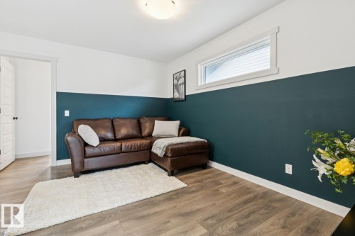 Wood-finish flooring with crisp white trim - 22434 99A Avenue Nw, Edmonton, AB 