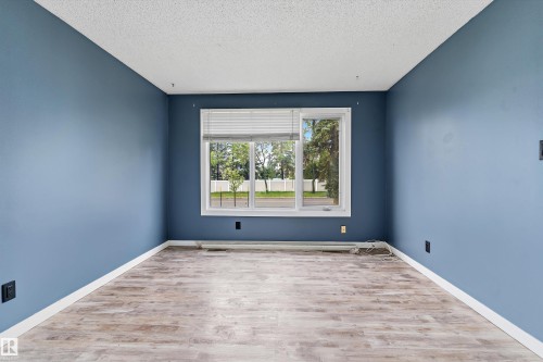 10930 Beaumaris Road Nw, Edmonton, AB - Indoor Photo Showing Other Room