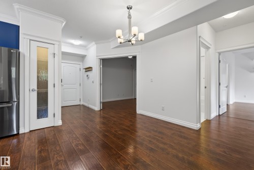 Hardwood-style flooring throughout - #210 10121 80 Av Nw, Edmonton, AB 