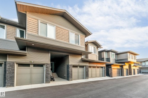 Modern multi-story exterior with horizontal siding and shake accents - #45 2710 66 St Sw, Edmonton, AB 