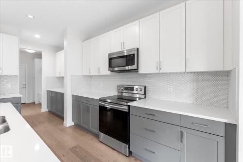 38 Ellice Bend, Fort Saskatchewan, AB - Indoor Photo Showing Kitchen With Upgraded Kitchen