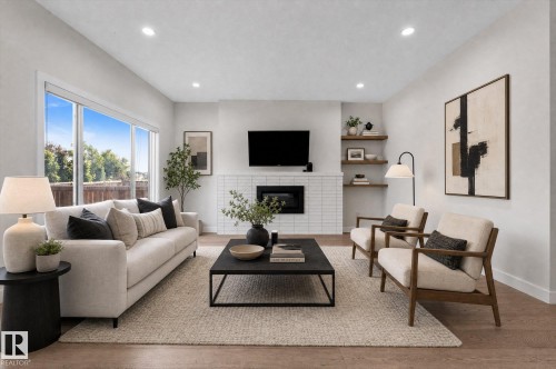 38 Ellice Bend, Fort Saskatchewan, AB - Indoor Photo Showing Living Room With Fireplace