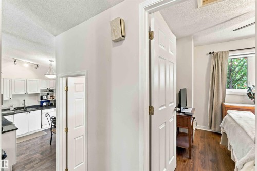 White paneled doors with brass hardware - #6 15 Poirier Av, St. Albert, AB 