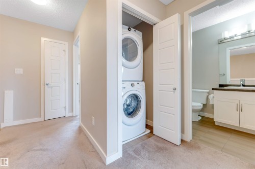 Integrated stacked laundry appliances - 3340 15A Avenue Nw, Edmonton, AB 