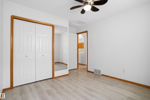Wood-finish flooring throughout the space - 2915 151A Avenue Nw, Edmonton, AB 