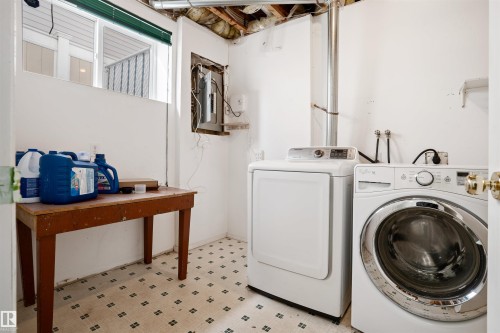 Utility area featuring pattern flooring and exposed ceiling joists - 2915 151A Avenue Nw, Edmonton, AB 