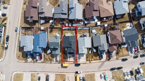Aerial property overview highlighting a residential structure with an attached garage and a private backyard space - 2915 151A Avenue Nw, Edmonton, AB 