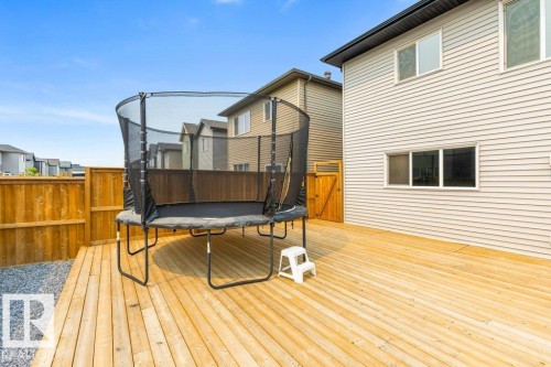 Expansive wood deck with a privacy fence - 7113 177A Avenue Nw, Edmonton, AB - Outdoor With Deck Patio Veranda With Exterior