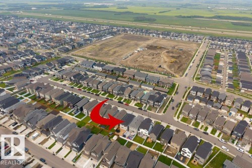 Aerial perspective showcasing a residential development with a mix of detached homes - 7113 177A Avenue Nw, Edmonton, AB - Other