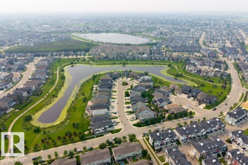 Aerial view of a residential community featuring numerous detached homes and townhomes - 7113 177A Avenue Nw, Edmonton, AB -  With View
