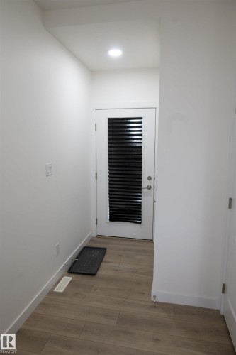 Wood-finish flooring - #64 2710 66 St Sw Sw, Edmonton, AB 
