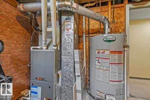 Forced air heating system and water heater installation - 13320 123 Street Nw, Edmonton, AB - Indoor Photo Showing Basement
