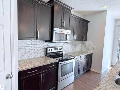 7819 173 Avenue Nw, Edmonton, AB - Indoor Photo Showing Kitchen With Stainless Steel Kitchen With Upgraded Kitchen