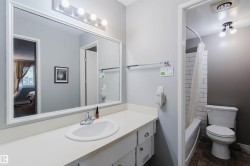 Vanity with an integrated sink, polished chrome faucet, and ample counter space - 