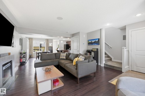 704 176 Street Sw, Edmonton, AB - Indoor Photo Showing Living Room With Fireplace