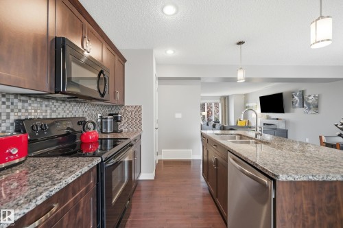 704 176 Street Sw, Edmonton, AB - Indoor Photo Showing Kitchen With Double Sink With Upgraded Kitchen